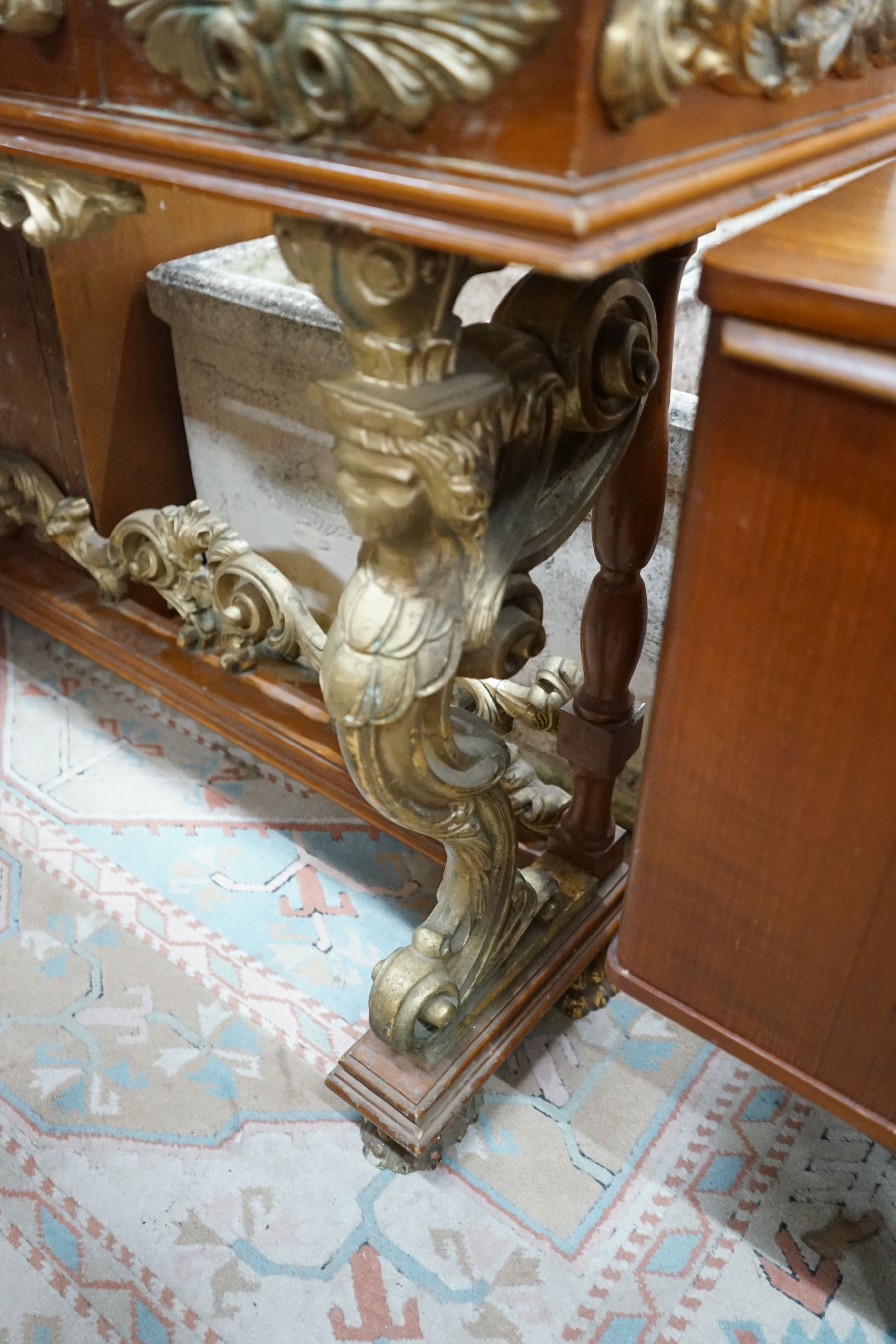 An 18th century style parcel gilt mahogany console table, width 136cm, depth 36cm, height 91cm